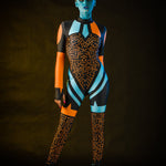 Blue Alien Halloween costume for women, featuring a full-body jumpsuit with tattoo effect on the back, inspired by UFO and alien themes, perfect for Halloween or cosplay events.