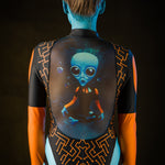 Close-up of the tattoo effect and blue alien design on the jumpsuit, ideal for a bold Halloween or UFO-inspired festival look.