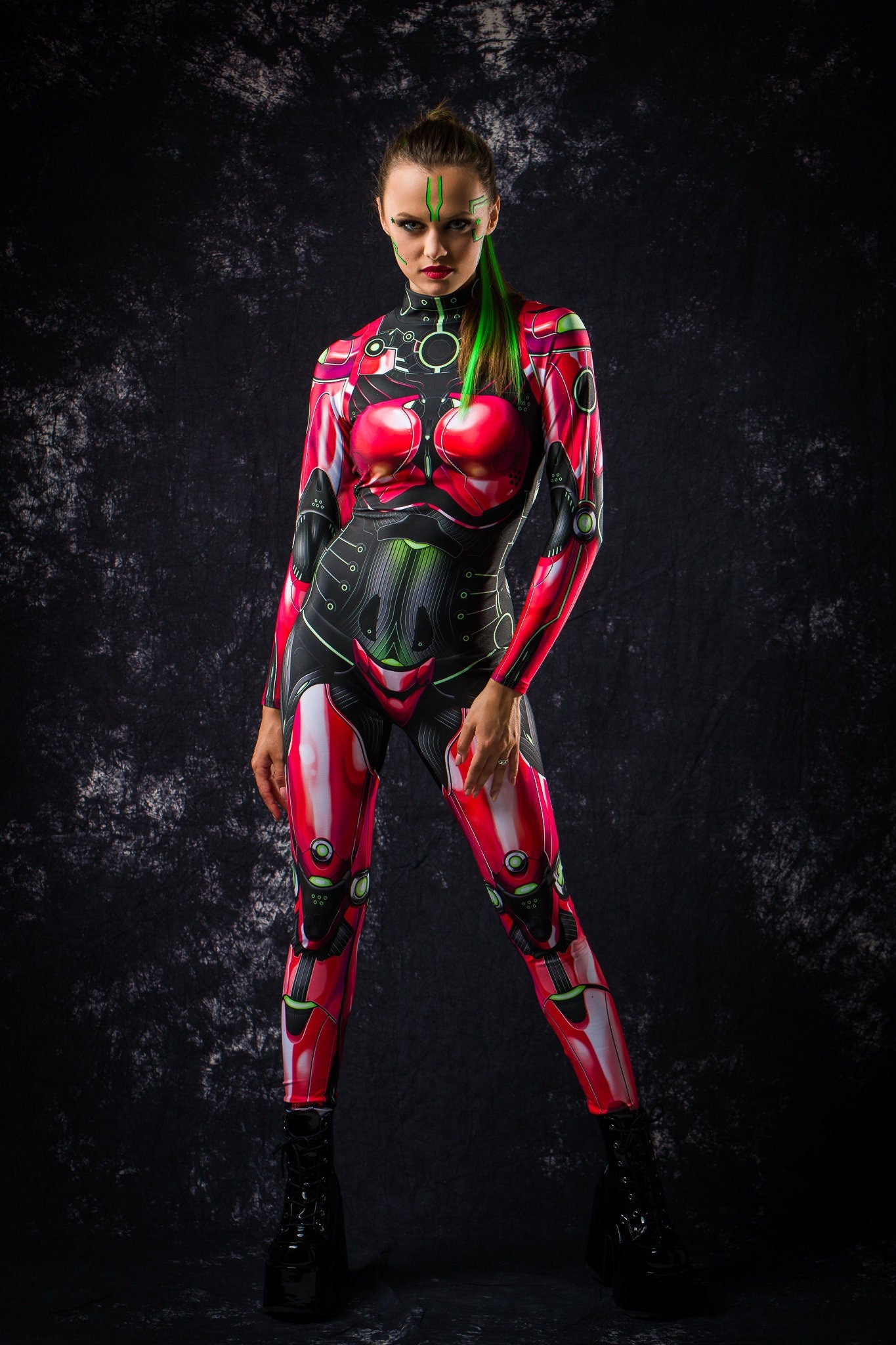 Red Android Halloween costume for women, featuring a full-body robotic catsuit with cyberpunk elements, perfect for Halloween or cosplay events.