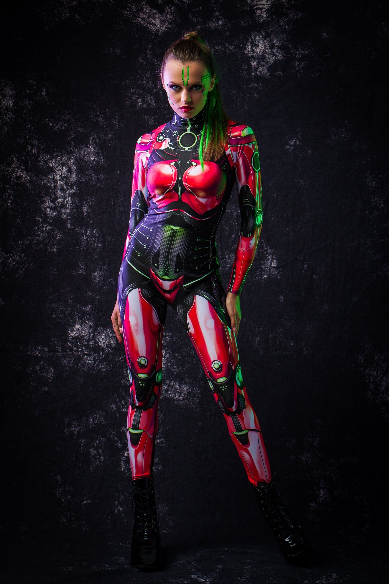 Woman wearing the Red Android costume, a full-body robot-inspired catsuit with cyberpunk details, perfect for Halloween parties or sci-fi cosplay.