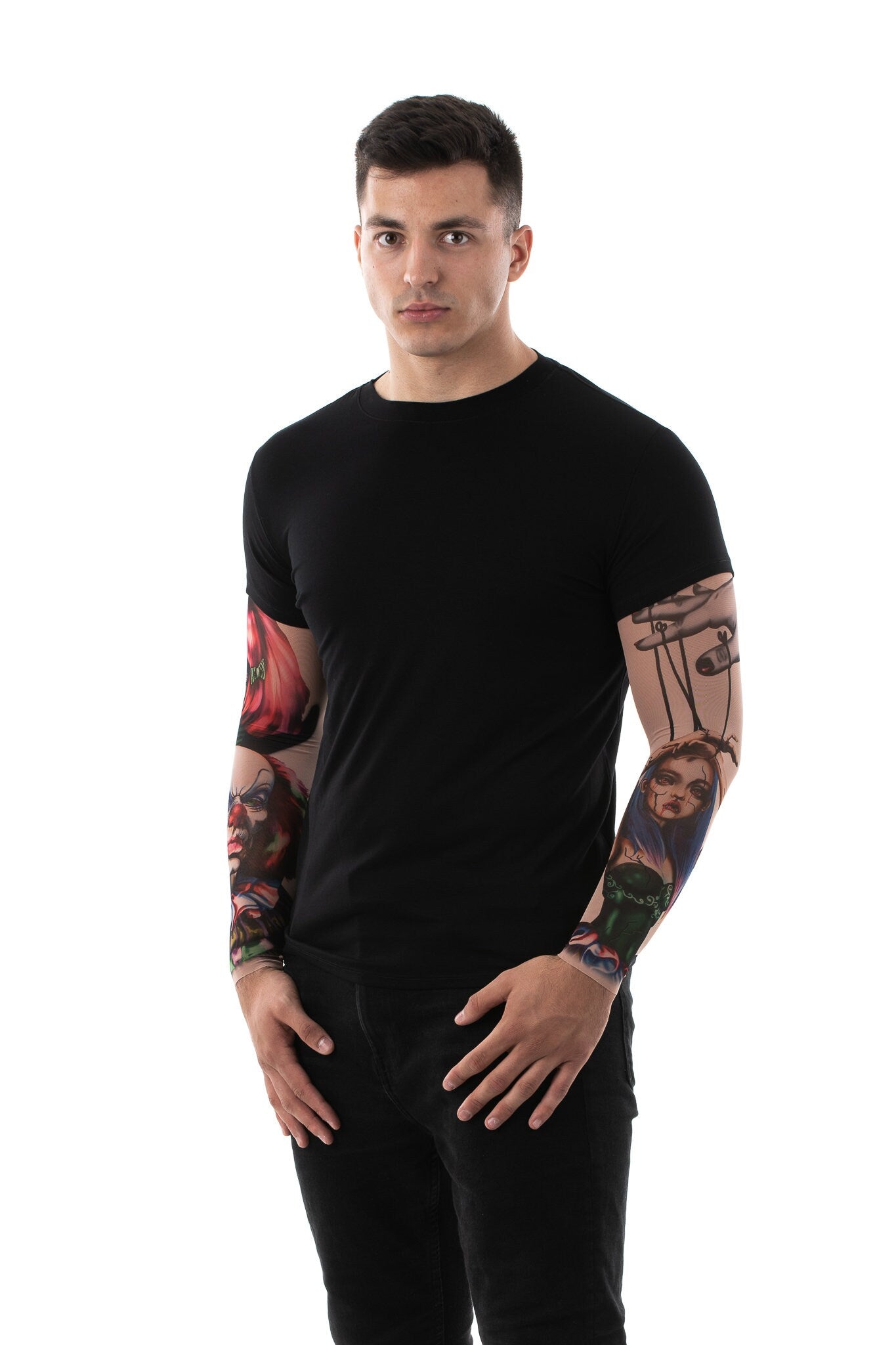 Man posing in the Zombie Circus Halloween T-shirt with tattoo sleeves, showcasing the detailed zombie and circus tattoo prints, great for Halloween or as a casual statement top.