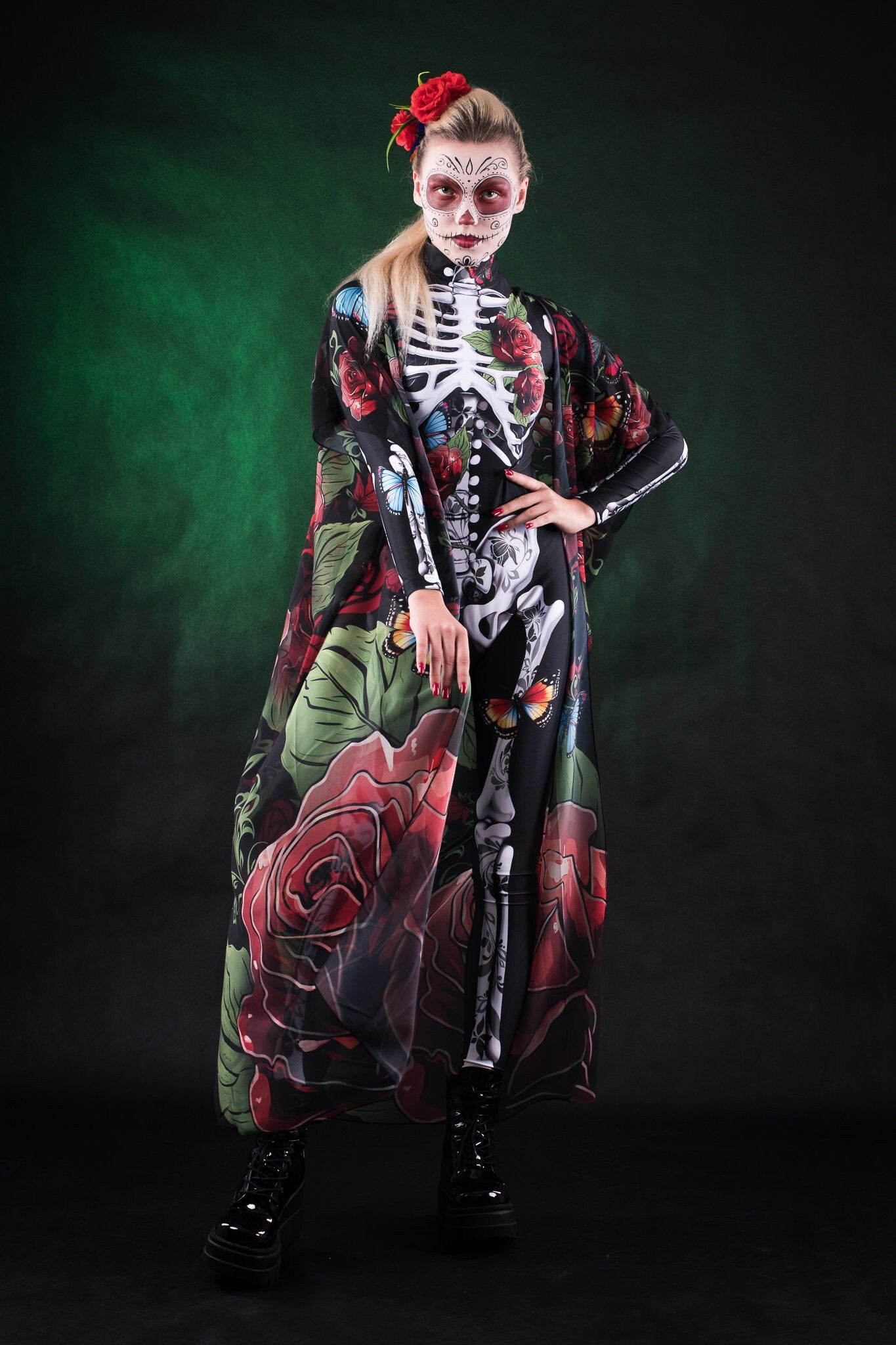 Woman wearing the Roses and Butterflies Kimono Halloween cape, with detailed floral and butterfly designs, perfect for Day of the Dead events or Halloween parties.