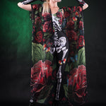 Woman wearing the Roses and Butterflies Kimono Halloween cape, with detailed floral and butterfly designs, perfect for Day of the Dead events or Halloween parties.