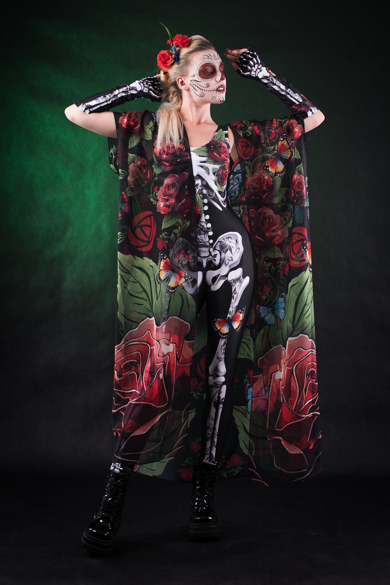 Woman wearing the Roses and Butterflies Kimono Halloween cape, with detailed floral and butterfly designs, perfect for Day of the Dead events or Halloween parties.