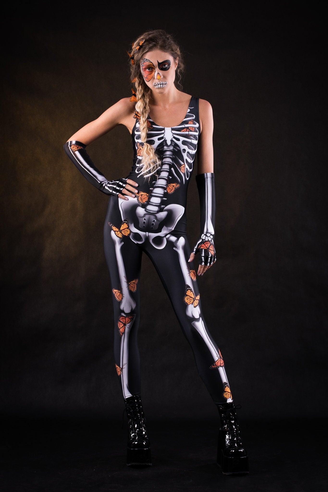 Orange Butterflies Skeleton Halloween costume for women, featuring a white skeleton jumpsuit with orange butterfly accents and a flowing kimono, perfect for Halloween or festivals.