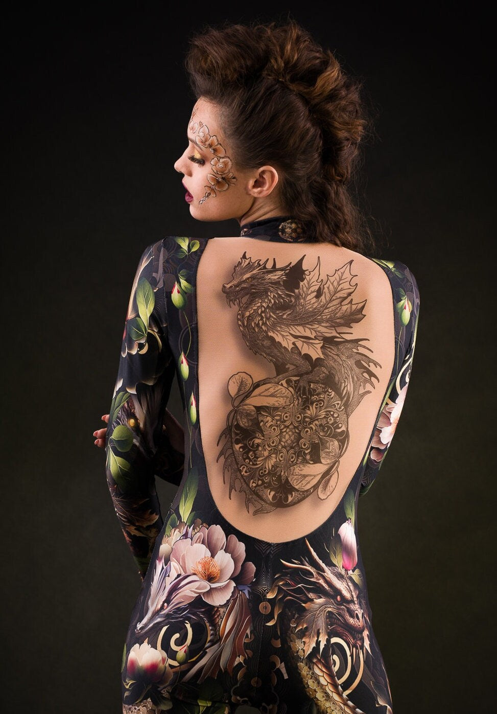 Close-up of the intricate dragon design and tattoo effect on the back of the Sister of Dragons catsuit, ideal for a bold Halloween or festival look.