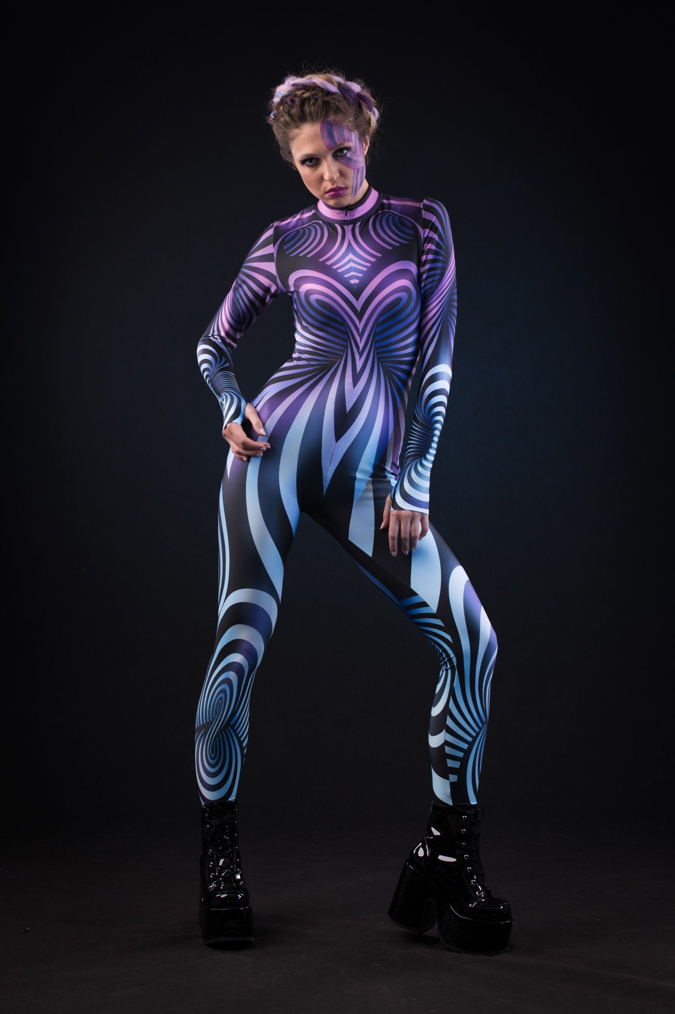 Woman posing in the Purple Spiral costume, showcasing the 3D spiral effect and vibrant purple design, great for Halloween or as a standout festival outfit.