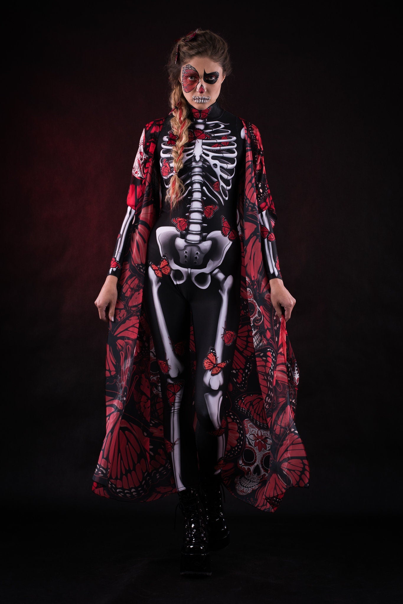 Close-up of the intricate red butterfly designs on the flowing kimono cape, ideal for adding a dramatic touch to Halloween or festival outfits.