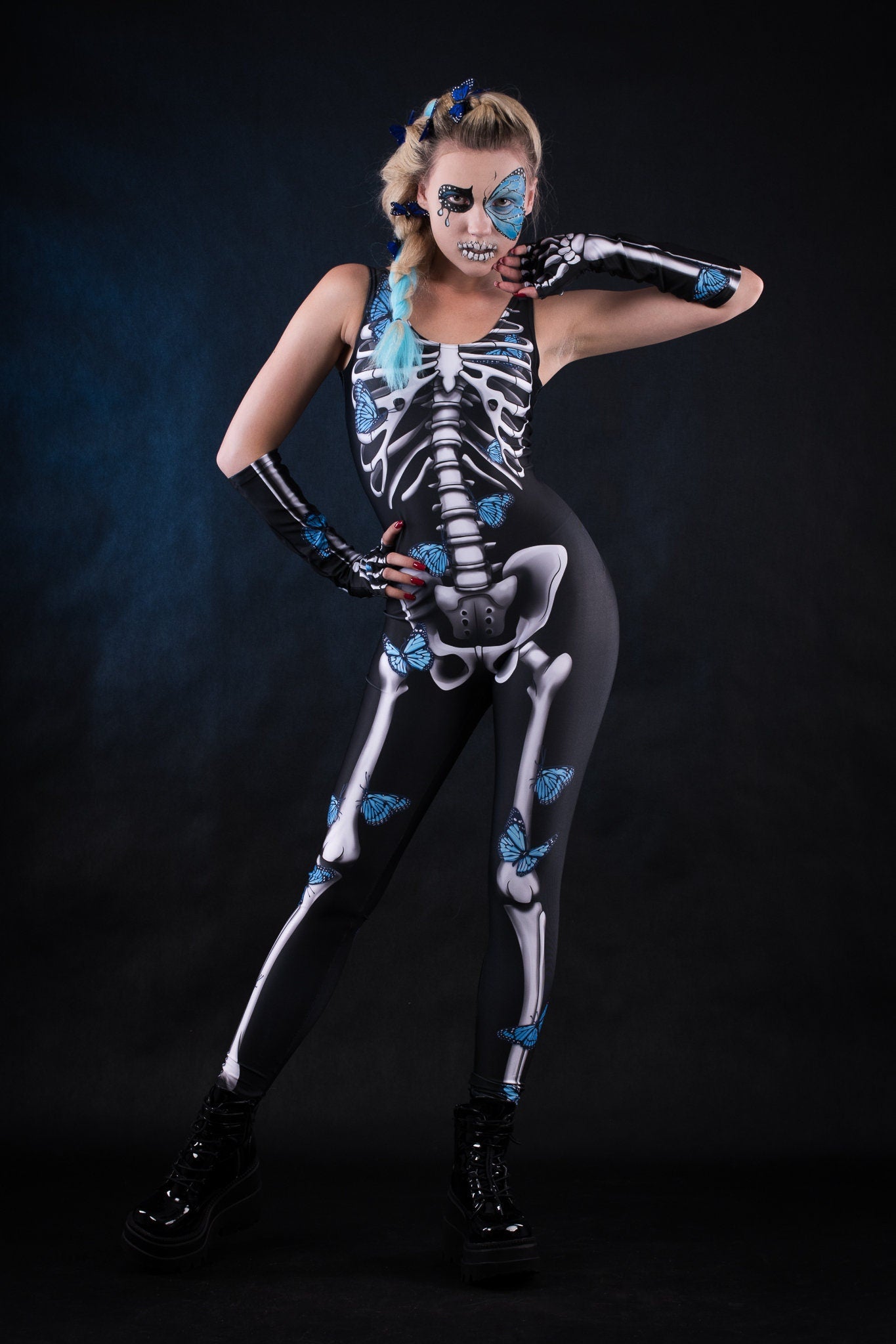 Close-up of the blue butterfly and white skeleton design on the jumpsuit, showing intricate details of the Blue Butterflies Skeleton costume.