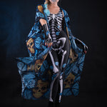 Blue Butterflies Skeleton jumpsuit and kimono set, featuring a white skeleton bodysuit with butterfly details, perfect for a unique Halloween costume and festival.