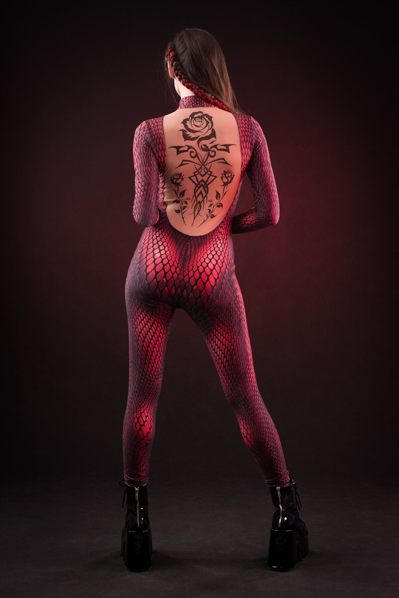 Close-up of the tattoo effect on the back of the Red Mamba catsuit, highlighting the intricate details and unique design.